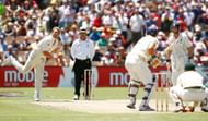 ADELAIDE, AUSTRALIA - DECEMBER 02:  Shane Warne of Australia bowls to Kevin Pietersen of England during day two of the second Ashes Test Match between Australia and England at the Adelaide Oval on December 2, 2006 in Adelaide, Australia.  (Photo by Tom Shaw/Getty Images)